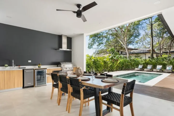 Pool and outdoor dining terrace at Casa #8