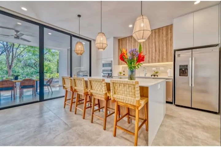 Kitchen island and covered terrace at House #1
